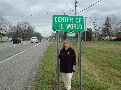 Bonnie Zurcher standing at the edge of the Center of the World, Ohio